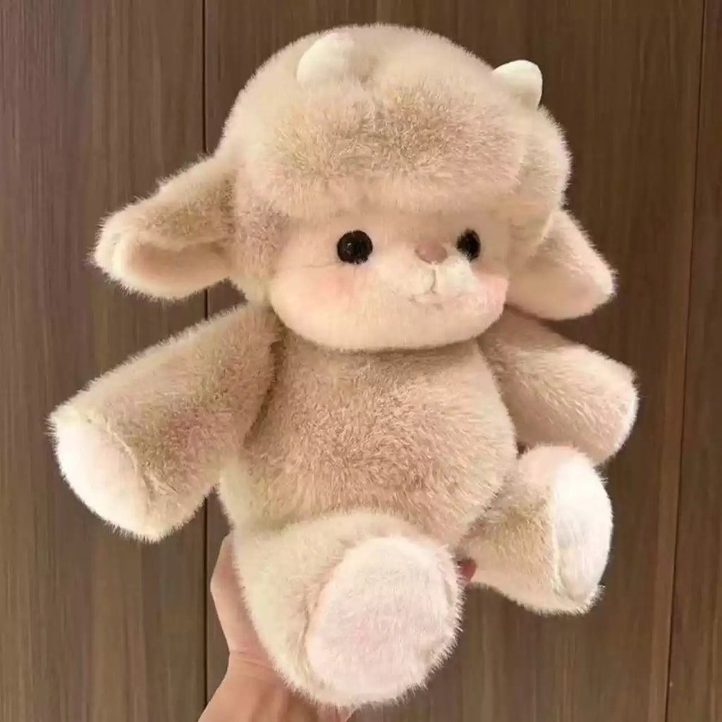 Plush toy with large ears held against a wooden background